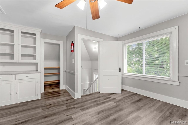 922 Maple, Wyandotte, MI 48192 - unfurnished bedroom with light wood-style floors, ceiling fan, and vaulted ceiling