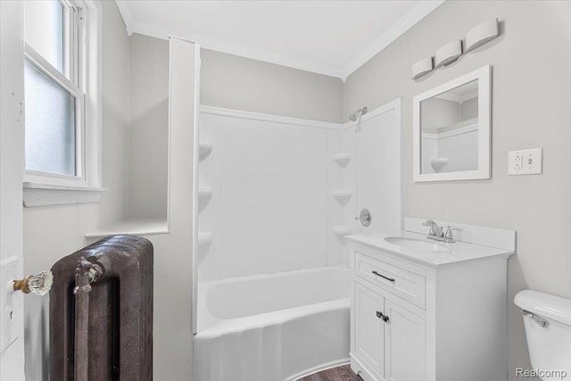 922 Maple, Wyandotte, MI 48192 - full bath with vanity, radiator,  shower combination, and crown molding