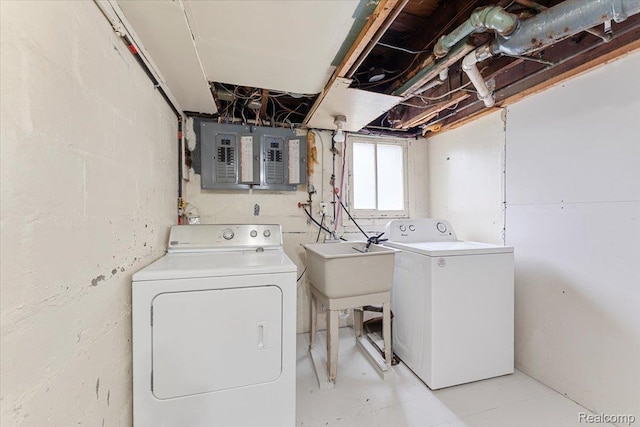 922 Maple, Wyandotte, MI 48192 - laundry area featuring independent washer and dryer and electric panel