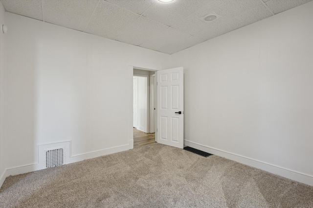 400 Burton St SW, Grand Rapids, MI 49507 - spare room featuring carpet floors and a drop ceiling