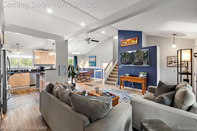5021 Paula Ave, Clarkston, MI 48346 - living room with vaulted ceiling, light wood-type flooring, ceiling fan, stairway, and recessed lighting