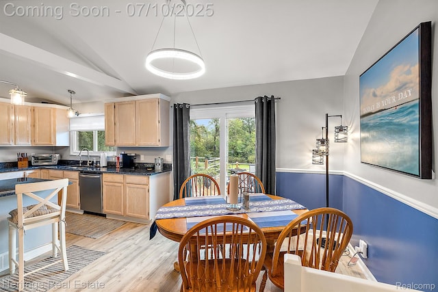 5021 Paula Ave, Clarkston, MI 48346 - dining room featuring lofted ceiling and light wood-style flooring