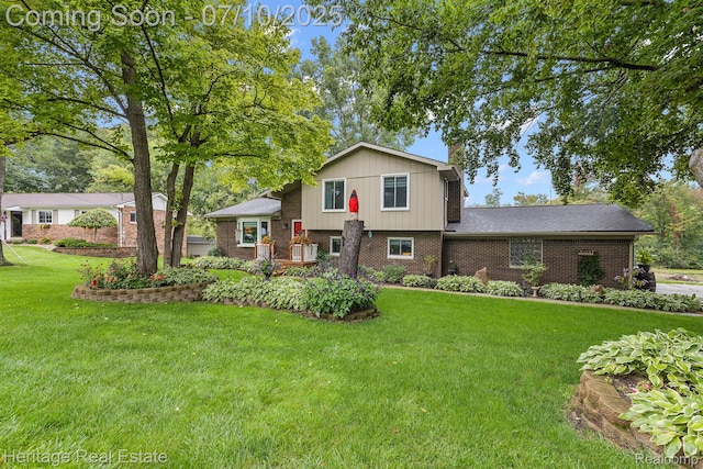5021 Paula Ave, Clarkston, MI 48346 - split level home featuring brick siding and a front lawn