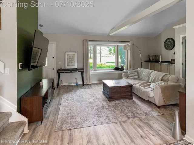 5021 Paula Ave, Clarkston, MI 48346 - living area with vaulted ceiling and wood finished floors
