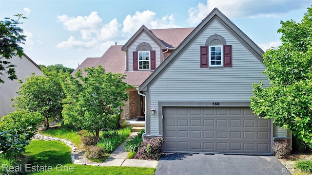 560 Boulder Lake Dr, Oxford, MI 48371 - traditional-style home with asphalt driveway and roof with shingles