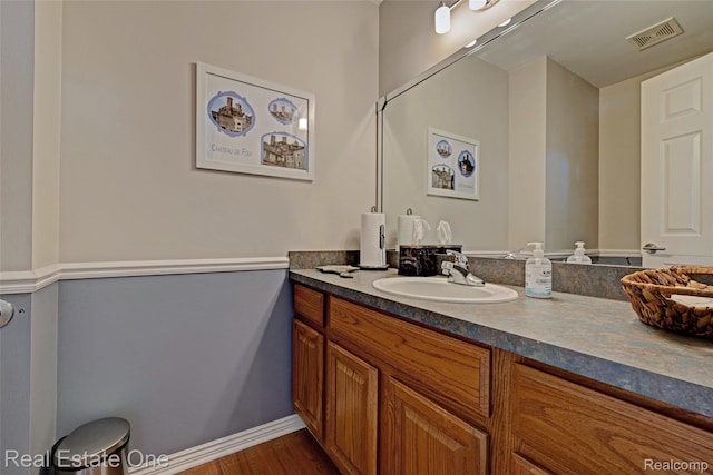 560 Boulder Lake Dr, Oxford, MI 48371 - bathroom with vanity and wood finished floors