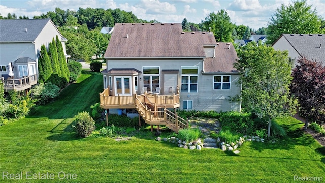 560 Boulder Lake Dr, Oxford, MI 48371 - back of house featuring a deck, stairway, a yard, and a shingled roof