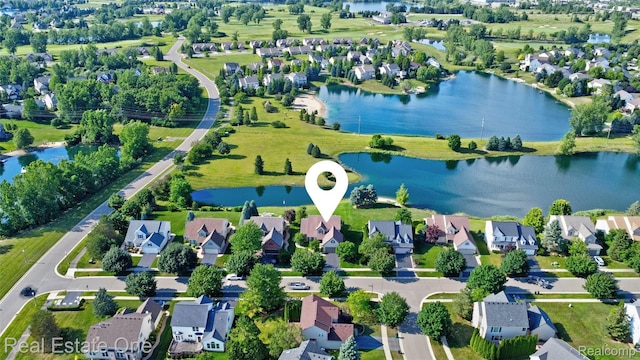 560 Boulder Lake Dr, Oxford, MI 48371 - aerial perspective of suburban area with a nearby body of water