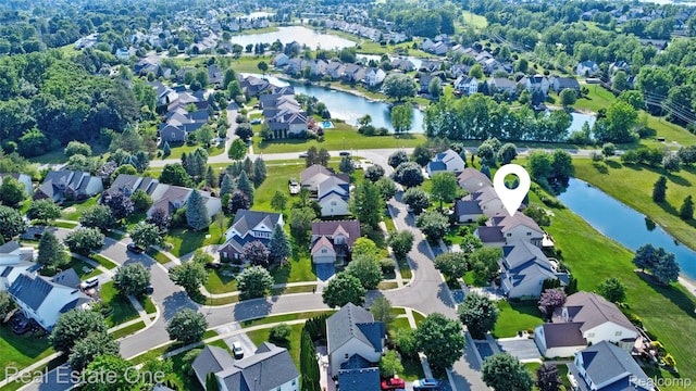 560 Boulder Lake Dr, Oxford, MI 48371 - aerial perspective of suburban area with a nearby body of water