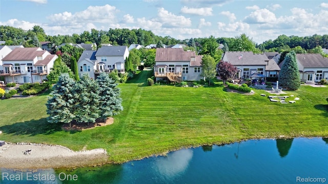560 Boulder Lake Dr, Oxford, MI 48371 - aerial view of residential area featuring a large body of water and a tree filled landscape