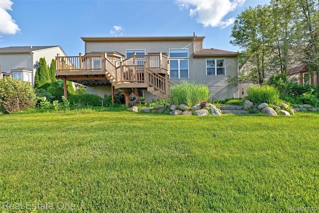 560 Boulder Lake Dr, Oxford, MI 48371 - back of house with a deck, a lawn, and stairs