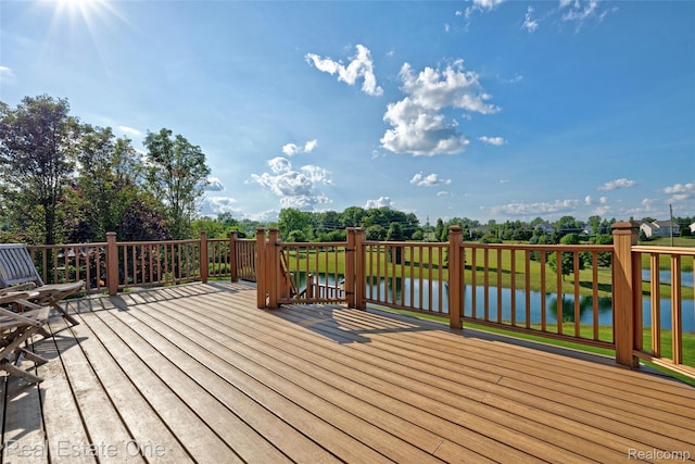 560 Boulder Lake Dr, Oxford, MI 48371 - wooden deck featuring a water view and view of scattered trees