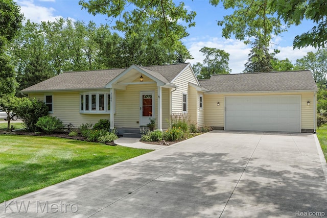 3180 Warringham Ave, Waterford, MI 48329 - view of front of house with concrete driveway, a garage, a front yard, and roof with shingles