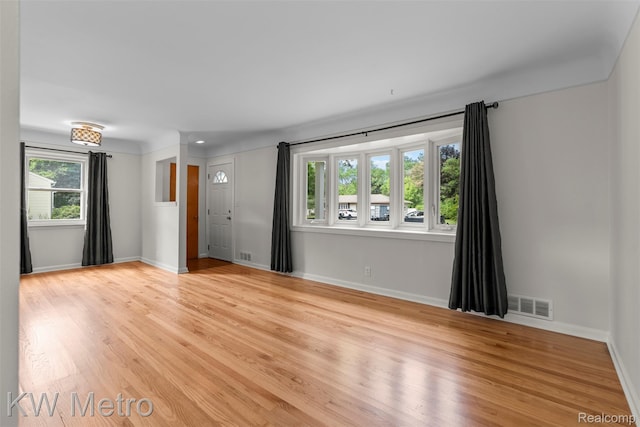 3180 Warringham Ave, Waterford, MI 48329 - spare room featuring wood finished floors