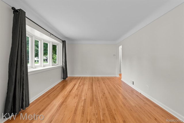3180 Warringham Ave, Waterford, MI 48329 - spare room with light wood-type flooring and baseboards