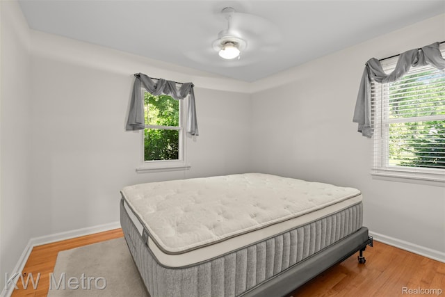 3180 Warringham Ave, Waterford, MI 48329 - bedroom featuring wood finished floors and ceiling fan