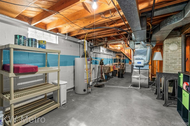 3180 Warringham Ave, Waterford, MI 48329 - below grade area featuring water heater and concrete block wall