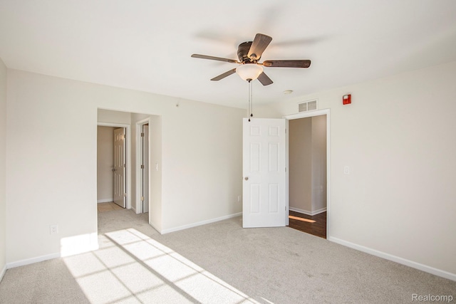 12129 Hidden View Ct, Utica, MI 48315 - unfurnished bedroom featuring light carpet and a ceiling fan