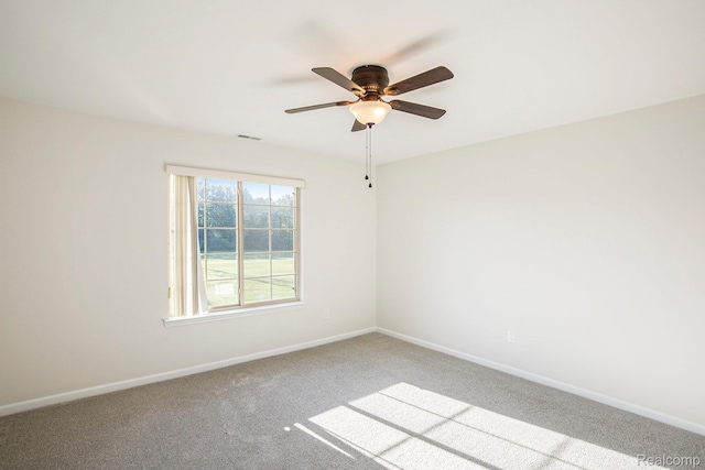 12129 Hidden View Ct, Utica, MI 48315 - carpeted spare room featuring ceiling fan and baseboards