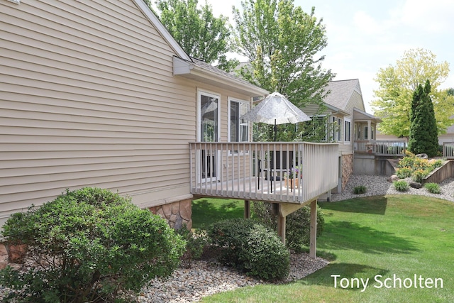 2956 Pebblestone Dr Unit 47, Hudsonville, MI 49426 - wooden terrace featuring a lawn