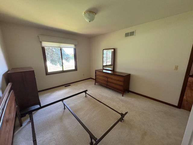 70173 Hillside Ct, Romeo, MI 48065 - unfurnished bedroom featuring light colored carpet and baseboards