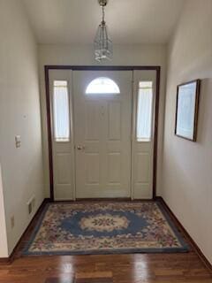 70173 Hillside Ct, Romeo, MI 48065 - entryway with wood finished floors and baseboards