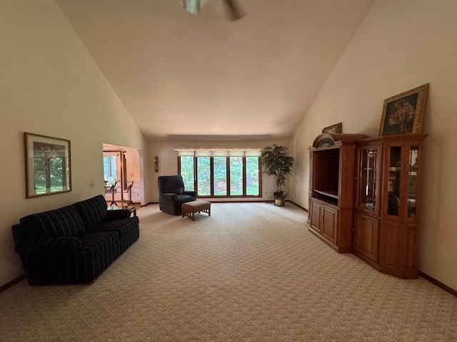 70173 Hillside Ct, Romeo, MI 48065 - living area featuring light colored carpet and high vaulted ceiling