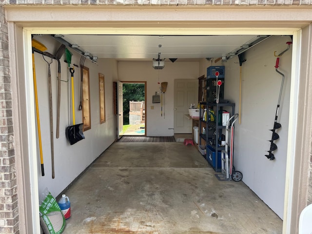 70173 Hillside Ct, Romeo, MI 48065 - garage featuring a garage door opener