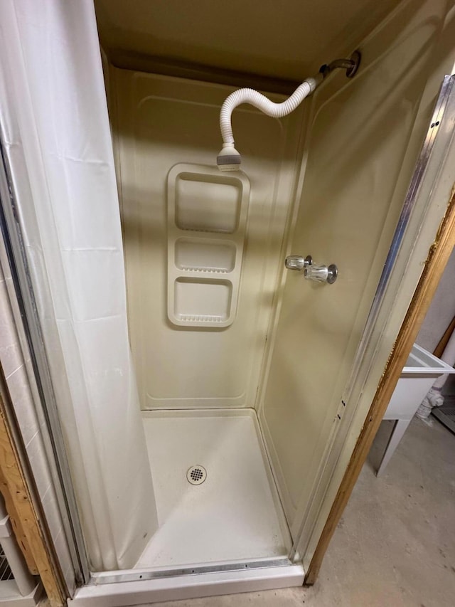 70173 Hillside Ct, Romeo, MI 48065 - bathroom featuring a stall shower