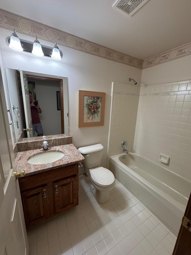 70173 Hillside Ct, Romeo, MI 48065 - bathroom featuring tile patterned floors, shower / washtub combination, and vanity