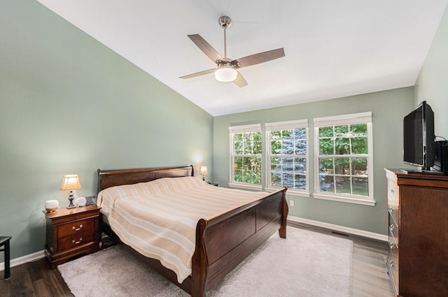 8191 Creekside Dr, Westland, MI 48185 - bedroom with lofted ceiling, dark wood finished floors, and ceiling fan