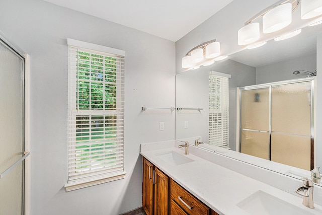 8191 Creekside Dr, Westland, MI 48185 - bathroom featuring double vanity and a shower stall