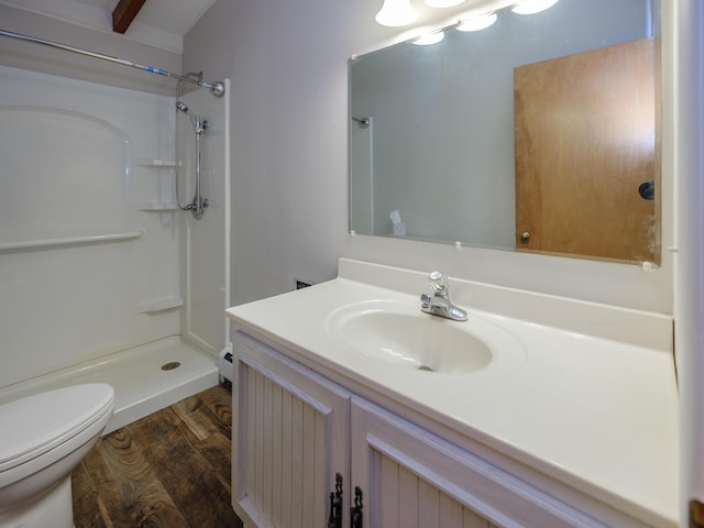 4409 E T U Ave, Vicksburg, MI 49097 - bathroom featuring vanity, wood finished floors, and a shower