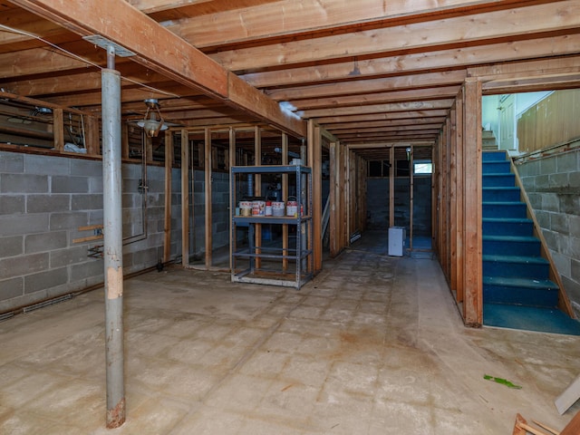 4409 E T U Ave, Vicksburg, MI 49097 - unfinished below grade area featuring stairway and concrete block wall
