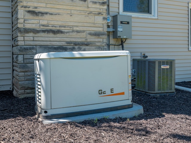 4409 E T U Ave, Vicksburg, MI 49097 - exterior view of a power unit and stone siding