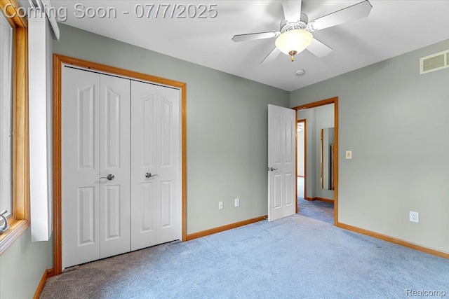 22069 Inkster Rd, Flat Rock, MI 48174 - unfurnished bedroom with carpet flooring, a closet, and ceiling fan