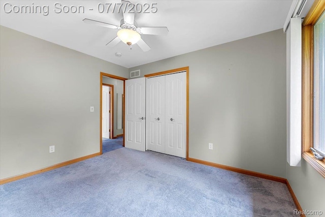 22069 Inkster Rd, Flat Rock, MI 48174 - unfurnished bedroom featuring carpet flooring, a closet, and ceiling fan