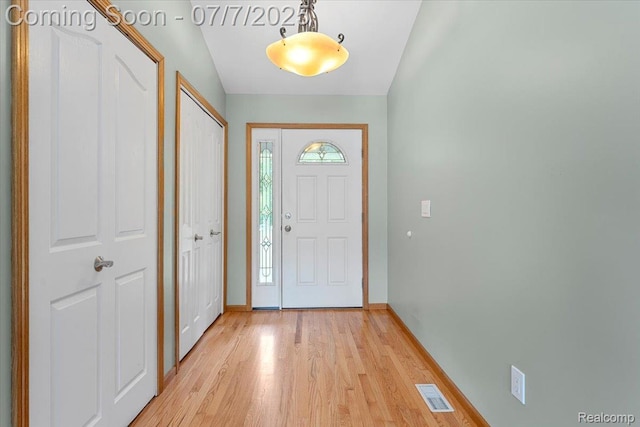 22069 Inkster Rd, Flat Rock, MI 48174 - entrance foyer with light wood-style flooring and baseboards