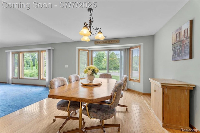 22069 Inkster Rd, Flat Rock, MI 48174 - dining room featuring plenty of natural light, light wood-style floors, and a chandelier