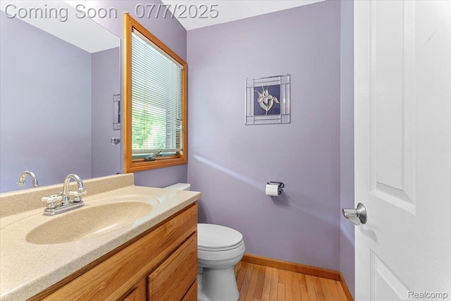 22069 Inkster Rd, Flat Rock, MI 48174 - bathroom featuring vanity and wood finished floors