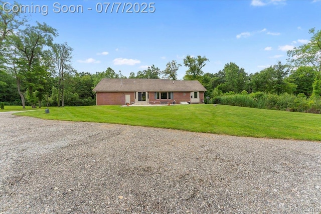 22069 Inkster Rd, Flat Rock, MI 48174 - view of front of house featuring a front lawn and driveway