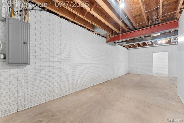 22069 Inkster Rd, Flat Rock, MI 48174 - unfinished basement featuring electric panel and brick wall