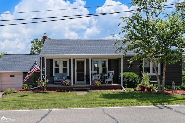 331 S St, Ortonville, MI 48462 - view of front of house with a porch, a chimney, a front yard, and roof with shingles