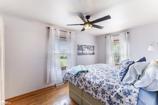 331 S St, Ortonville, MI 48462 - bedroom with wood finished floors and a ceiling fan
