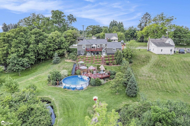 331 S St, Ortonville, MI 48462 - view of subject property featuring a tree filled landscape