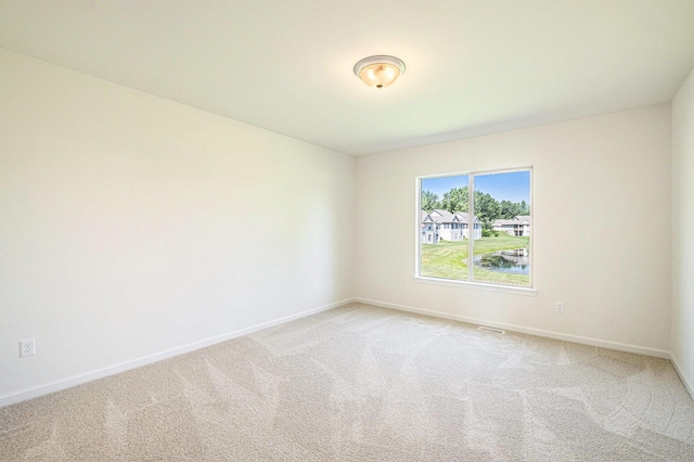 5391 Swan Ln, Burton, MI 48509 - unfurnished room with light colored carpet
