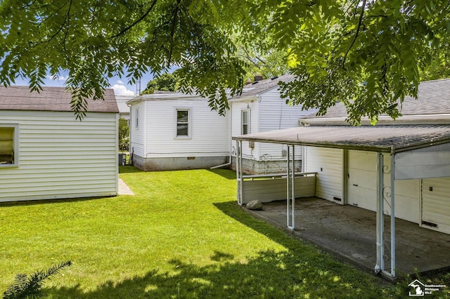 917 E 8th St, Monroe, MI 48161 - view of grassy yard featuring a patio