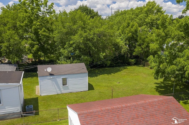 917 E 8th St, Monroe, MI 48161 - fenced backyard featuring an outdoor structure