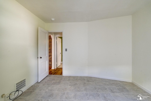 917 E 8th St, Monroe, MI 48161 - empty room featuring baseboards and a smoke detector