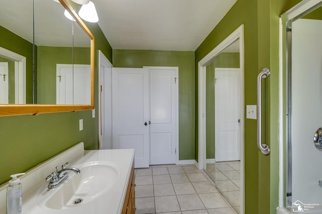917 E 8th St, Monroe, MI 48161 - bathroom featuring tile patterned flooring and vanity